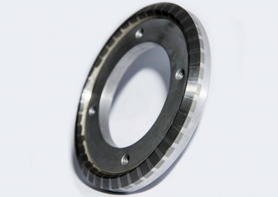 Detaljer i rostfritt - Drivring, hårdmetallring, legodetaljer